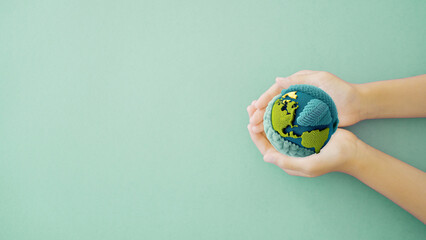 Hands holding planet earth,  save planet, earth day, environment day, csr social responsibility,...