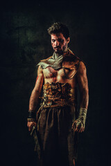 Fototapeta na wymiar Portrait of an ethnic warrior,a saber in his hand