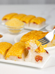 Pastry made of yellow rice(coarse rice), Panicum miliaceum and white sugar,traditional Chinese snack