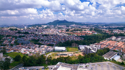 Aerial view of the Pirituba neighborhood in Sao Paulo, Brazil. Pico do Jaraguá in the background.