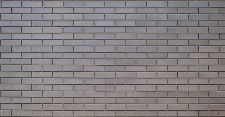 Exterior grey brick wall with regular shape