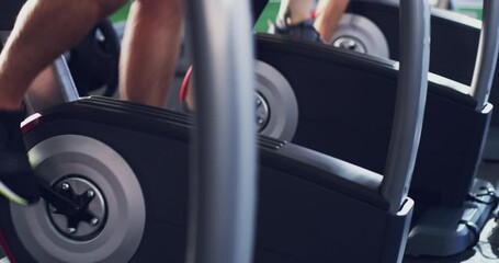 Cycling, fitness and shoes of people in gym for workout, exercise and health in spin class. Wellness, sports and training with athlete in elliptical bike for performance, cardio and stamina endurance