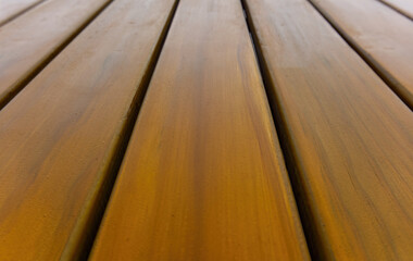 wood battens fence close up perspective view. abstract texture background no people.