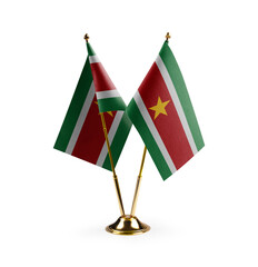 Small national flags of the Suriname on a white background