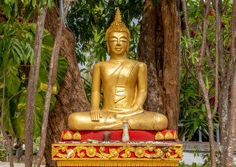 Golden Buddha statue at Wat Hosian Voravihane Buddhist Temple in Luang Prabang Laos