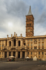 Fototapeta na wymiar 2019-11-01 A TWO TONED BRICK GOVERMENT BUILDING IN ROME ITALY WITH A CLOUDY SKY