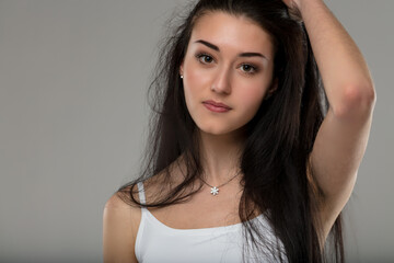 Naklejka premium Carefree, well-groomed woman, intense gaze