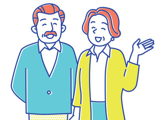 笑顔でこちらを見て手を挙げるシニア夫婦