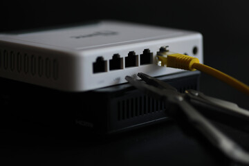 Modern dual band wireless router. Man working in the background. Fast and wireless internet concept.