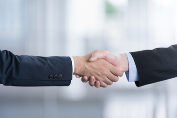 Image of a successful business transaction or business meeting Close-up of hands of two men in...