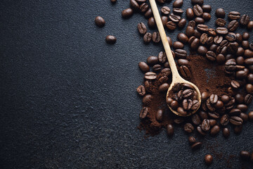 Coffee beans on wooden old background