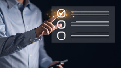 Businessman pointing to a check box on a to-do list graphic. Conceptual image for productivity, task management, and organization in the workplace