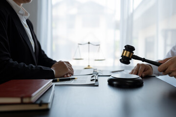 Lawyer or legal advisor finalizes the contract. Business legal agreements, constraints, consulting between lawyers and business clients, tax and legal firms. the concept of righteousness and justice