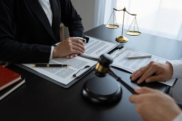 Lawyer or legal advisor finalizes the contract. Business legal agreements, constraints, consulting between lawyers and business clients, tax and legal firms. the concept of righteousness and justice