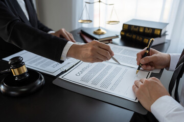 Businessmen and lawyers discuss and explain the contract documents Legal treaty before the signing of a business contract.