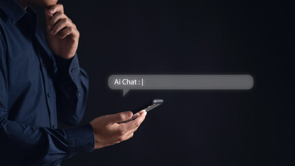 Businessman using his cell phone to communicate with an AI chatbot, representing modern digital technology and customer service