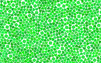 Background of green hearts with several four-leaf clovers in the gaps