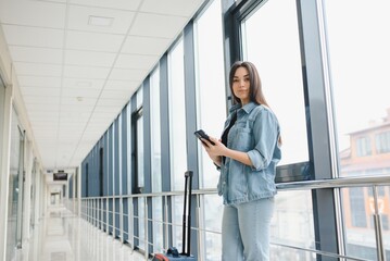 Girl at the airport window