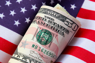 Fototapeta premium American dollars and American flag