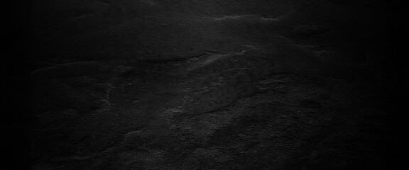 Natural black slate stone background pattern with high resolution. Top view, copy space.