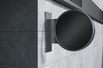 Perspective view on sunlit grey concrete wall background with blank black round signboard with place for your brand name, logo or text, advertising and marketing concept. 3D rendering, mock up