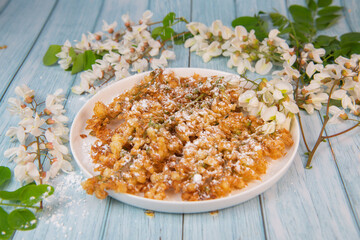 Acacia flowers fritters, Blossoming acacia with leafs, , Robinia pseudoacacia, White acacia, High quality photo