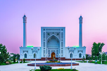 The Minor Mosque covered with white marble in the center of Tashkent at sunset.