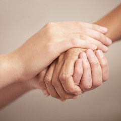 Empathy, help and love with people holding hands in comfort, care or to console each other. Trust,...