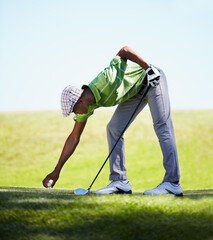 Sports, golfer and black man with golf ball on lawn for game, match and competition on golfing...