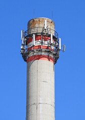 Smoke stack of the power station with antennas