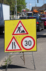 Traffic signs at the road construction site