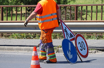 Construction worker at the road construction site