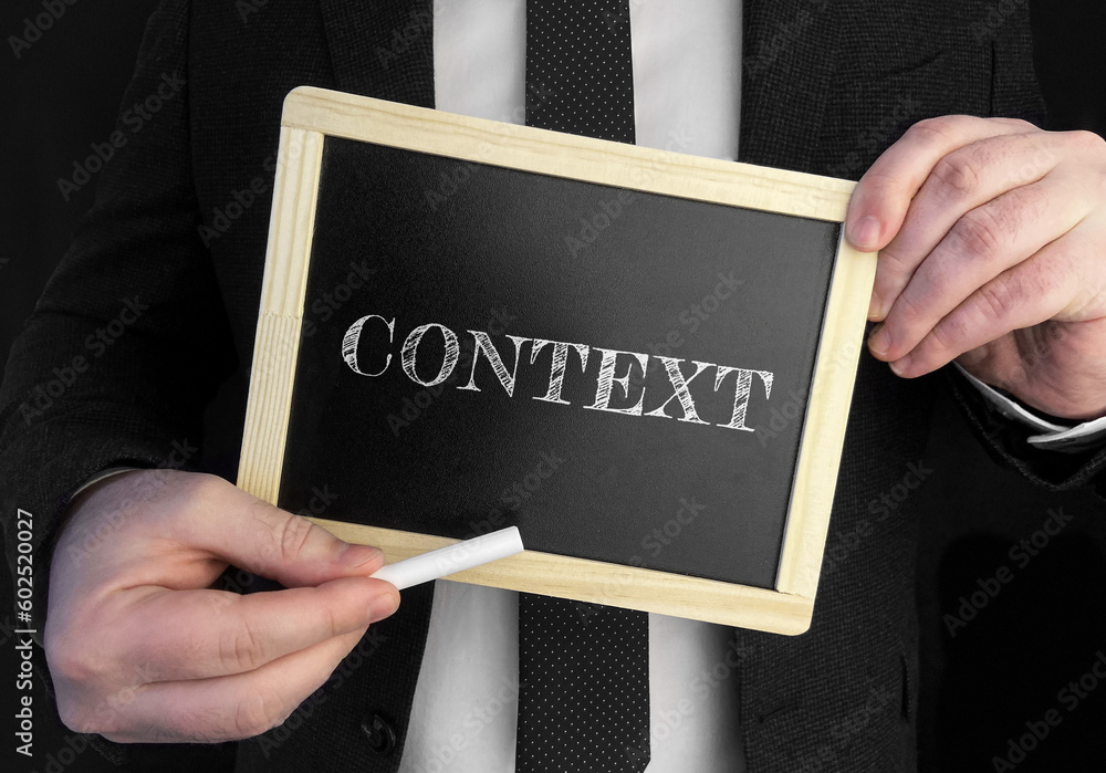 Poster a businessman holds up a chalkboard with text context