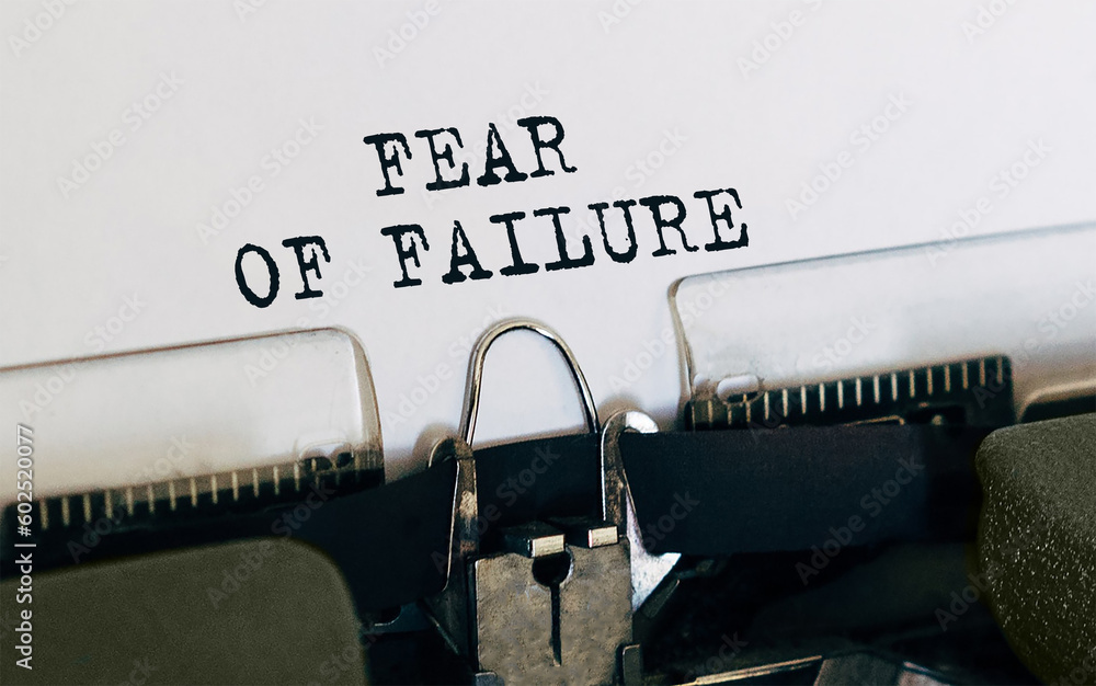 Poster text fear of failure typed on retro typewriter