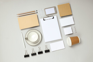 Mockup flat lay with different office accessories on light gray background