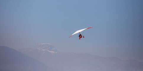 Naklejka na ściany i meble Denizli, Turkey, April 30, 2023: Preparation for flights on paramotors. Flying on paramotor