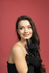 Young woman model on pink background, beauty
