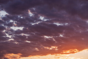 Naklejka na ściany i meble Amazing colorful clouds on the evening sunset.