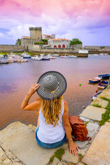 Woman tourist in Ciboure, Socoa Fort- Saint Jean de Luz- tourism in France,  Basque country, Nouvelle aquitaine - obrazy, fototapety, plakaty