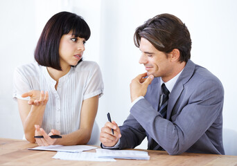 Business people in discussion about paperwork in meeting, team in conference room and collaboration. Data analysis, employees coworking with man and woman in office, teamwork and review documents