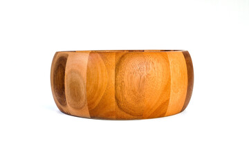 Wooden bowl placed on a white background