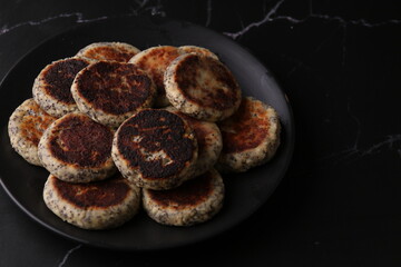 photo fried curd cakes with poppy seeds