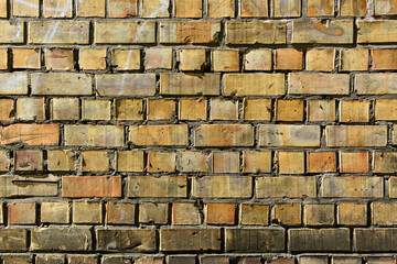 Naklejka premium sunlight on the wall of an old brick as a background 5