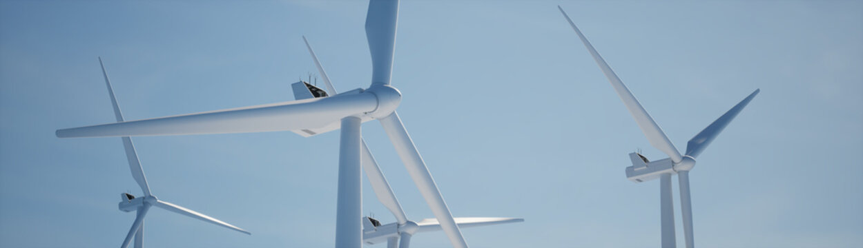 Clean shot of 3 of wind turbines producing electricity against bright blue sky. Background for sustainable energy conference, website header