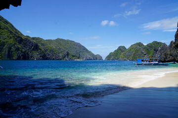 traditional wooden outrigger boats on palawan island