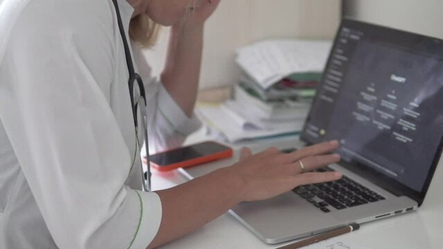 May 13, 2023, Turkey, Alanya. A female doctor uses GPT chat at work