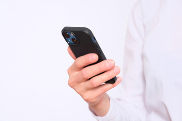 Businesswoman holds a smartphone