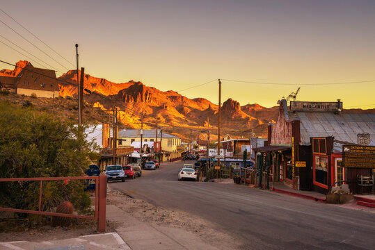 Oatman, Arizona, USA - December 28, 2017 : Sunset in Oatman on the historic Route 66. This former mining town is situated in the Black Mountains of Mohave County in Arizona.