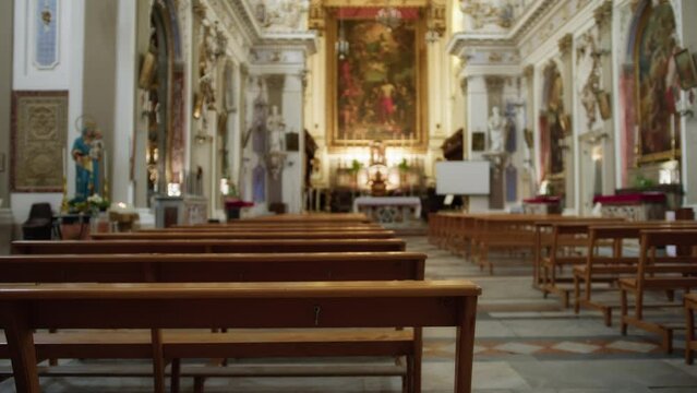 Wooden bench seats of an Italian Christian church