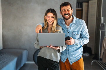 Portrait of success business people working together in home office. Couple teamwork startup concept